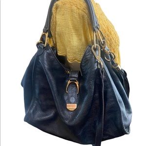 GILL genuine leather hobo bag in black with tassel and shoulder strap